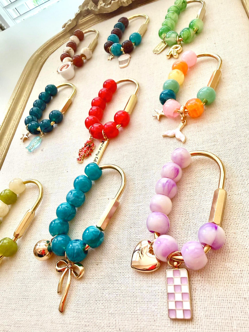 Golden Carabiner Bag Charm with Glass Heart – Beaded Citrus Tones