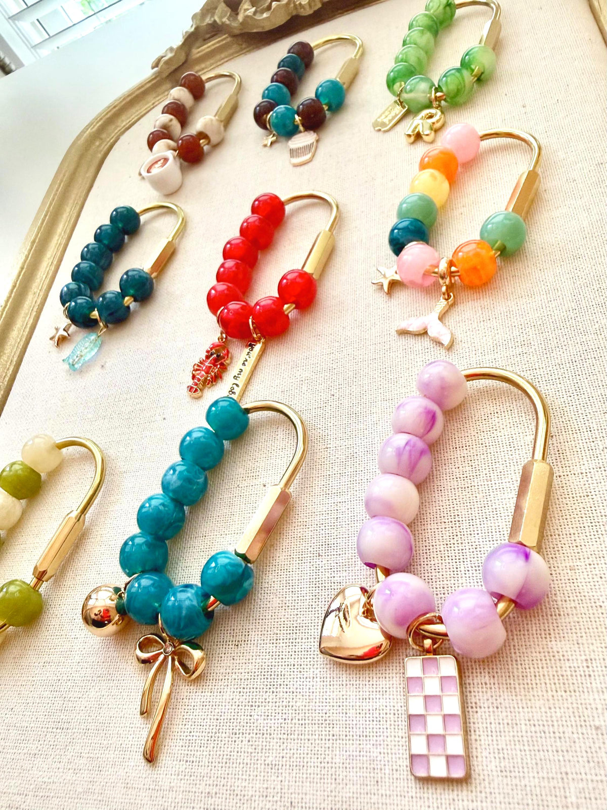 Golden Carabiner Bag Charm with Glass Heart – Beaded Citrus Tones